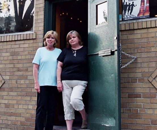 Nancy (right) with her sister Marie, standing in the threshold of The Shannon