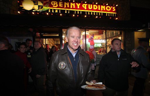 Vice President Joe Biden grabs a slice from Benny Tudino's after touring Hoboken in the wake of Superstorm Sandy (NJ.com/Star-Ledger photo—2012).